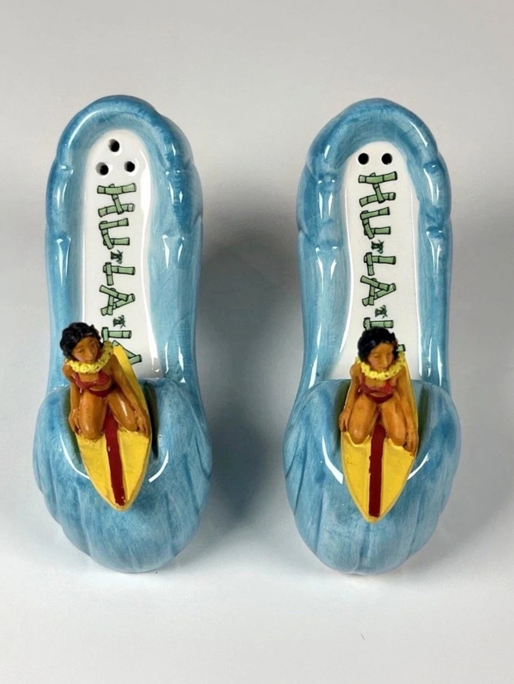Hand-painted ceramic Hula Girl shoe-shaped salt and pepper shaker set Blue